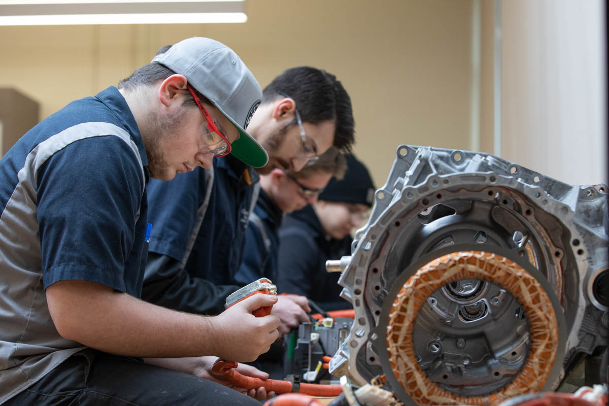 Men working in car shop