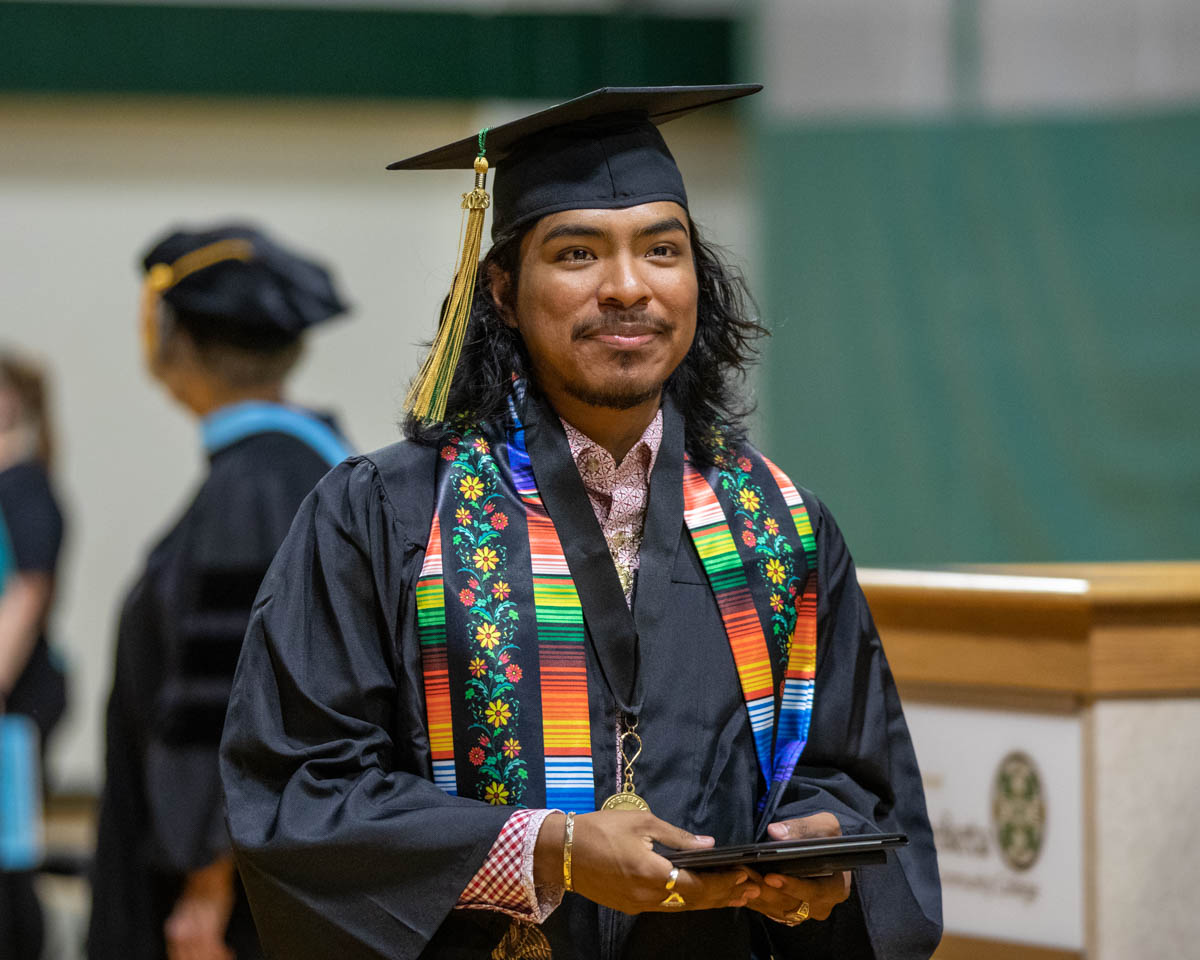 Man dressed for graduation