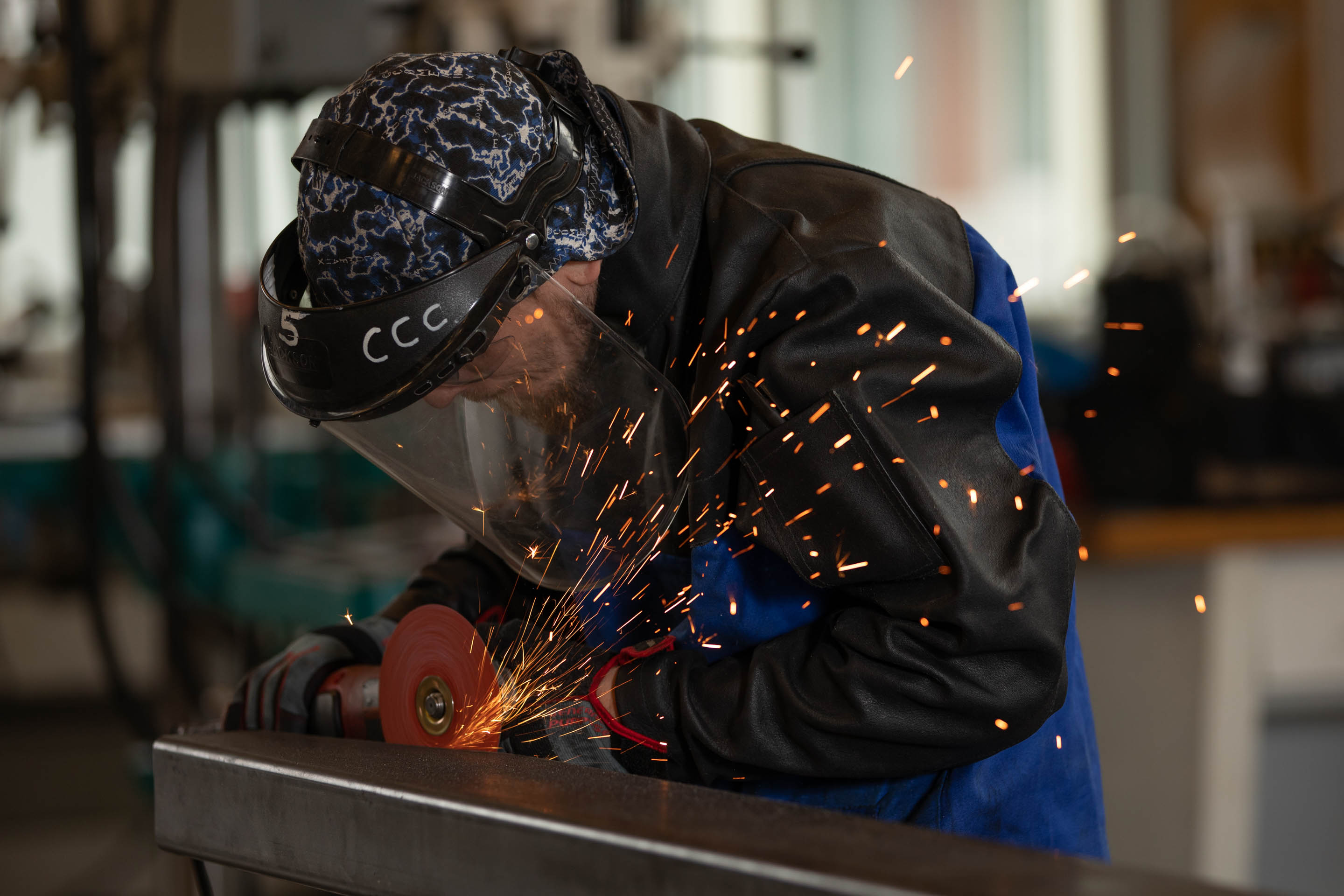 Man using a metal grinder